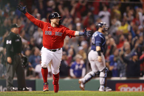 BOSTON, MASSACHUSETTS – OCTOBER 10: Christian Vazquez #7 of the Boston Red Sox celebrates his game winning two-run homerun in the 13th inning against the Tampa Bay Rays during Game 3 of the American League Division Series at Fenway Park on October 10, 2021 in Boston, Massachusetts. (Photo by Maddie Meyer/Getty Images)