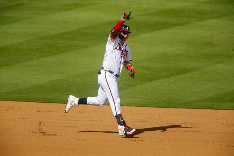 ATLANTA, GEORGIA – OCTOBER 11: Joc Pederson #22 of the Atlanta Braves reacts after hitting a three run home during the fifth inning against the Milwaukee Brewers in game 3 of the National League Division Series at Truist Park on October 11, 2021 in Atlanta, Georgia. (Photo by Michael Zarrilli/Getty Images)