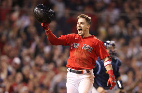 BOSTON, MASSACHUSETTS - OCTOBER 11: Enrique Hernandez #5 of the Boston Red Sox celebrates his game winning sacrifice fly in the ninth inning against the Tampa Bay Rays during Game 4 of the American League Division Series at Fenway Park on October 11, 2021 in Boston, Massachusetts. (Photo by Maddie Meyer/Getty Images)