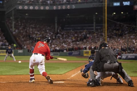 BOSTON, MA – OCTOBER 11: Christian Vazquez #7 of the Boston Red Sox hits a single during the ninth inning of game four of the 2021 American League Division Series against the Tampa Bay Rays at Fenway Park on October 11, 2021 in Boston, Massachusetts. (Photo by Billie Weiss/Boston Red Sox/Getty Images)