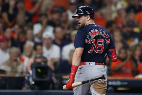 HOUSTON, TEXAS – OCTOBER 22: Kyle Schwarber #18 of the Boston Red Sox reacts after striking out against the Houston Astros during the third inning in Game Six of the American League Championship Series at Minute Maid Park on October 22, 2021 in Houston, Texas. (Photo by Elsa/Getty Images)