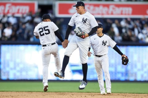 NEW YORK, NEW YORK – APRIL 09: Aaron Judge #99 and Gleyber Torres #25 of the New York Yankees celebrate after defeating the Boston Red Sox in the game at Yankee Stadium on April 09, 2022 in New York City. (Photo by Dustin Satloff/Getty Images)