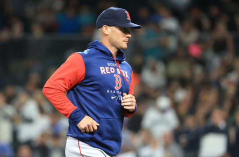 SEATTLE, WASHINGTON – JUNE 10: Pitching coach Dave Bush #58 of the Boston Red Sox jogs back to the dugout during the fifth inning against the Seattle Mariners at T-Mobile Park on June 10, 2022 in Seattle, Washington. (Photo by Abbie Parr/Getty Images)