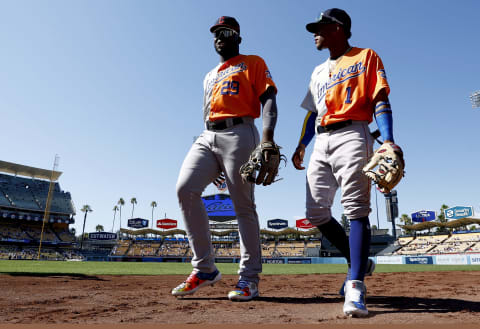 LOS ANGELES, CALIFORNIA – JULY 16: Jhonkensy Noel #29 and Ceddanne Rafaela #1 of the American League walk to the dugout before the SiriusXM All-Star Futures Game at Dodger Stadium on July 16, 2022 in Los Angeles, California. (Photo by Ronald Martinez/Getty Images)