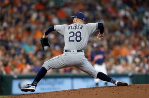 HOUSTON, TEXAS – OCTOBER 02: Corey Kluber #28 of the Tampa Bay Rays pitches in the second inning against the Tampa Bay Rays at Minute Maid Park on October 02, 2022 in Houston, Texas. (Photo by Tim Warner/Getty Images)