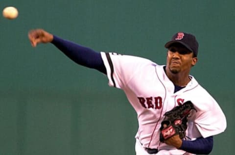 BOSTON, UNITED STATES: Boston Red Sox pitcher Pedro Martinez throws against the Anaheim Angels in the first inning at Fenway Park 23 August, 2002 in Boston, MA. AFP PHOTO/JOHN MOTTERN (Photo credit should read JOHN MOTTERN/AFP via Getty Images)