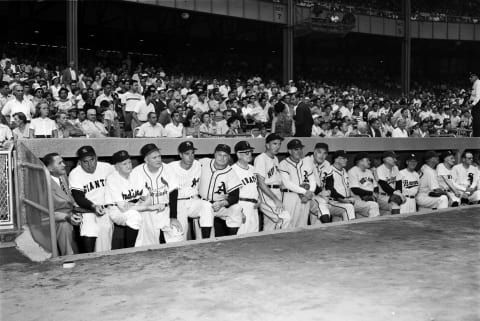 BRONX, NY – 1955: Joe McCarthy, Bill Terry, Cy Young, Rogers Hornsby, Joe DiMaggio, Jimmie Foxx, unidentified, Carl Hubbell, Mickey Cochrane, Al Simmons, Robert “Lefty” Grove, Joe Cronin, Dazzy Vance, George Sisler, Unidentified, George “Hooks” Wiltse, and Ted Lyons pose for a portrait in the dugout prior to Old Timer’s Day in 1955 at Yankee Stadium in the Bronx, New York. (Photo by Olen Collection/Diamond Images/Getty Images)