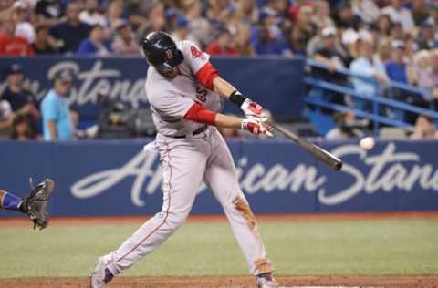 TORONTO, ON – AUGUST 7: J.D. Martinez #28 of the Boston Red Sox hits a double in the seventh inning during MLB game action against the Toronto Blue Jays at Rogers Centre on August 7, 2018 in Toronto, Canada. (Photo by Tom Szczerbowski/Getty Images)