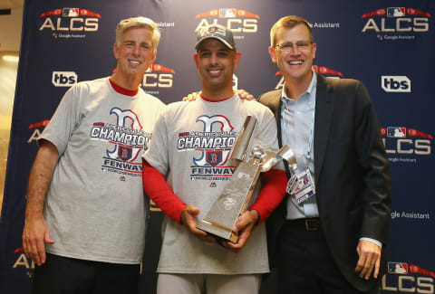 HOUSTON, TX – OCTOBER 18: (L-R) Dave Dombrowski, President of Baseball Operations for the Boston Red Sox, manager Alex Cora, and Sam Kennedy, President and CEO of the Boston Red Sox, pose with the William Harridge Trophy after the Boston Red Sox defeated the Houston Astros 4-1 in Game Five of the American League Championship Series to advance to the 2018 World Series at Minute Maid Park on October 18, 2018 in Houston, Texas. (Photo by Elsa/Getty Images)