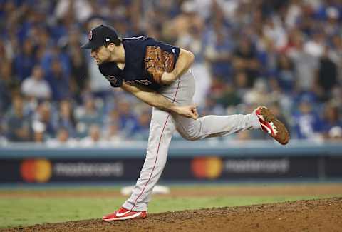 LOS ANGELES, CA – OCTOBER 26: Nathan Eovaldi #17 of the Boston Red Sox delivers the pitch during the thirteenth inning against the Los Angeles Dodgers in Game Three of the 2018 World Series at Dodger Stadium on October 26, 2018 in Los Angeles, California. (Photo by Ezra Shaw/Getty Images)