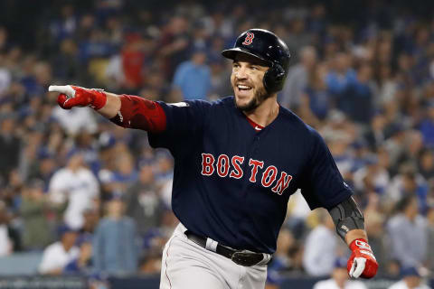 LOS ANGELES, CA – OCTOBER 28: Steve Pearce #25 of the Boston Red Sox celebrates his eighth-inning home run against the Los Angeles Dodgers in Game Five of the 2018 World Series at Dodger Stadium on October 28, 2018, in Los Angeles, California. (Photo by Sean M. Haffey/Getty Images)