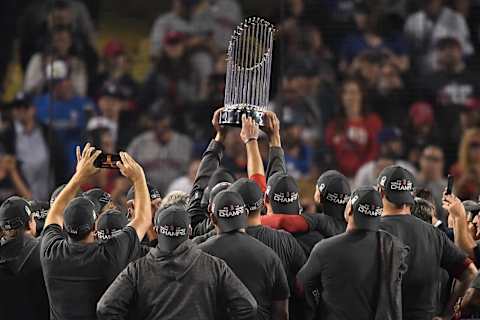 LOS ANGELES, CA – OCTOBER 28: The Boston Red Sox celebrate with the World Series trophy after their 5-1 win over the Los Angeles Dodgers in Game Five to win the 2018 World Series at Dodger Stadium on October 28, 2018 in Los Angeles, California. (Photo by Kevork Djansezian/Getty Images)