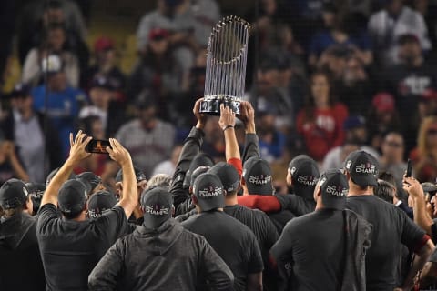 LOS ANGELES, CA – OCTOBER 28: The Boston Red Sox celebrate with the World Series trophy after their 5-1 win over the Los Angeles Dodgers in Game Five to win the 2018 World Series at Dodger Stadium on October 28, 2018, in Los Angeles, California. (Photo by Kevork Djansezian/Getty Images)