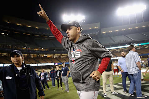 LOS ANGELES, CA – OCTOBER 28: Alex Cora #20 of the Boston Red Sox celebrates his team’s 5-1 win over the Los Angeles Dodgers in Game Five of the 2018 World Series at Dodger Stadium on October 28, 2018, in Los Angeles, California. (Photo by Ezra Shaw/Getty Images)