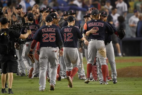 LOS ANGELES, CA – OCTOBER 27: Steve Pearce #25 , Brock Holt #12, Xander Bogaerts #2 and Craig Kimbrel #46 of the Boston Red Sox celebrate with teammates after defeating the Los Angeles Dodgers 9-6 in Game Four of the 2018 World Series at Dodger Stadium on October 27, 2018 in Los Angeles, California. (Photo by Kevork Djansezian/Getty Images)