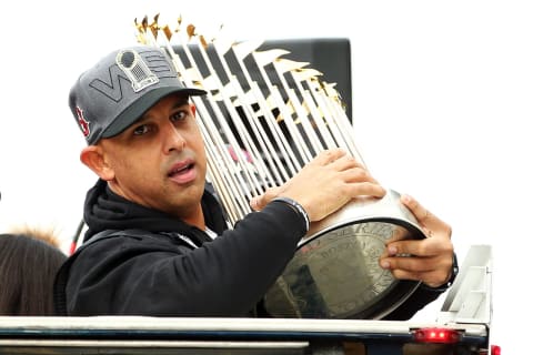 BOSTON, MA – OCTOBER 31: Boston Red Sox Manager Alex Cora holds the World Series trophy during the 2018 World Series victory parade on October 31, 2018 in Boston, Massachusetts. (Photo by Adam Glanzman/Getty Images)