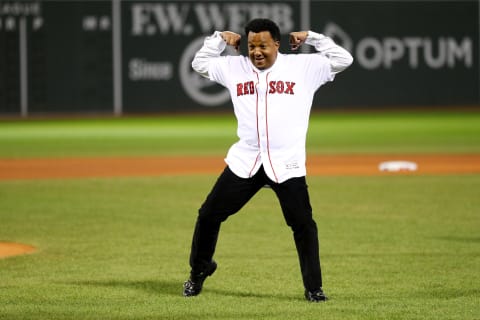 BOSTON, MA – OCTOBER 24: Former Boston Red Sox pitcher Pedro Martinez throws out the ceremonial first pitch with his former teammates prior to Game Two of the 2018 World Series between the Boston Red Sox and the Los Angeles Dodgers at Fenway Park on October 24, 2018 in Boston, Massachusetts. (Photo by Maddie Meyer/Getty Images)