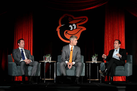 BALTIMORE, MD – NOVEMBER 19: Louis Angelos (L) and John Angelos (R) of the Baltimore Orioles look on after introducing Mike Elias (C) to the media as the Orioles Executive Vice President and General Manager (Photo by Rob Carr/Getty Images)