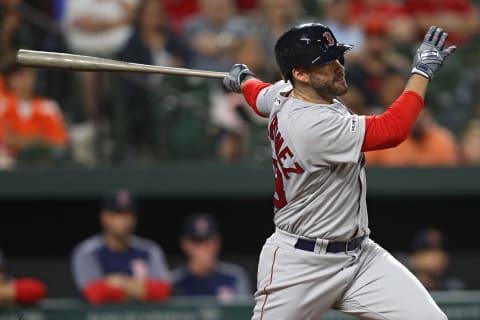 BALTIMORE, MARYLAND – JUNE 14: J.D. Martinez #28 of the Boston Red Sox hits a solo home run against the Baltimore Orioles during the fifth inning at Oriole Park at Camden Yards on June 14, 2019 in Baltimore, Maryland. (Photo by Patrick Smith/Getty Images)