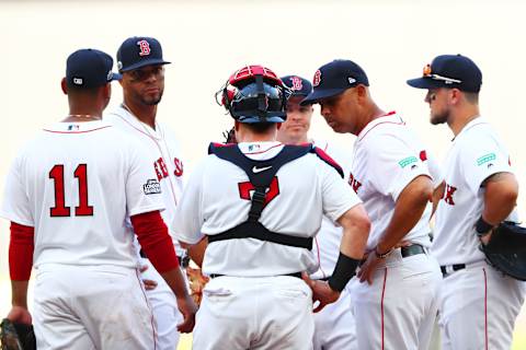 LONDON, ENGLAND – JUNE 29: Alex Cora #20 manager of the Boston Red Sox speaks with his players during the MLB London Series game between Boston Red Sox and New York Yankees at London Stadium on June 29, 2019 in London, England. (Photo by Dan Istitene – Pool/Getty Images)