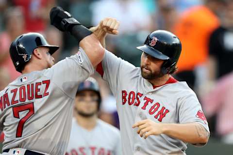 BALTIMORE, MARYLAND – JULY 19: Sam Travis #59 of the Boston Red Sox celebrates with Christian Vazquez #7 after hitting a two RBI home run in the second inning against the Baltimore Orioles at Oriole Park at Camden Yards on July 19, 2019 in Baltimore, Maryland. (Photo by Rob Carr/Getty Images)