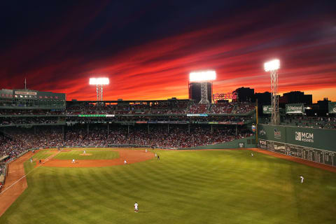 BOSTON, MASSACHUSETTS – SEPTEMBER 05: The sun sets behind Fenway Park during the second inning of the game between the Boston Red Sox and the Minnesota Twins on September 05, 2019 in Boston, Massachusetts. (Photo by Maddie Meyer/Getty Images)