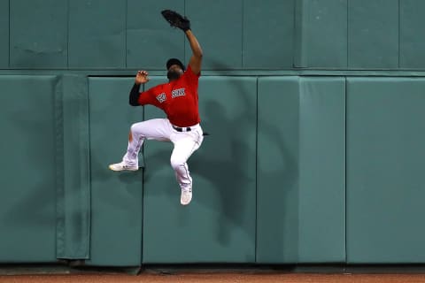 BOSTON, MASSACHUSETTS – SEPTEMBER 09: Jackie Bradley Jr. #19 of the Boston Red Sox catches a fly ball hit by Edwin Encarnacion #30 of the New York Yankees during the seventh inning of the game between the Boston Red Sox and the New York Yankees at Fenway Park on September 09, 2019 in Boston, Massachusetts. (Photo by Maddie Meyer/Getty Images)