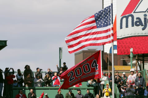 BOSTON – APRIL 11: The Boston Red Sox raise a 2004 World Series Championship flag during a pre-game ceremony celebrating the Red Sox win in the World Series. The ceremony was held prior to the game against the New York Yankees at Fenway Park on April 11, 2005 in Boston, Massachusetts. The Red Sox won 8-1. (Photo by Ezra Shaw /Getty Images)