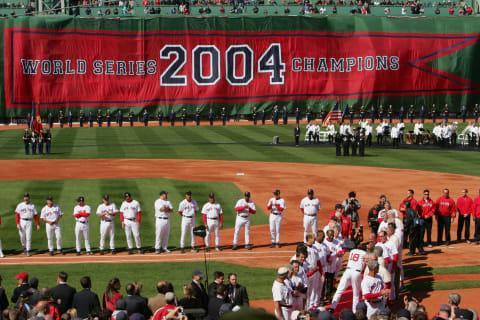 BOSTON – APRIL 11: The Boston Red Sox celebrate their 2004 World Series Championship during a pre-game ceremony prior to the game against the New York Yankees at Fenway Park on April 11, 2005 in Boston, Massachusetts. The Red Sox won 8-1. (Photo by Ezra Shaw /Getty Images)