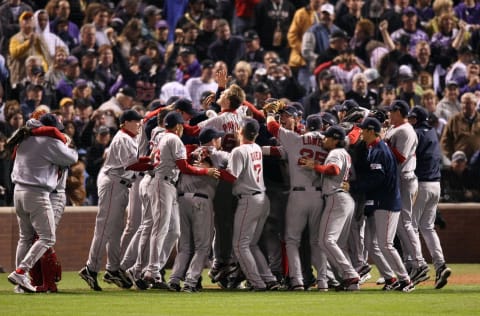 DENVER – OCTOBER 28: The Boston Red Sox celebrate after winning Game Four by a score of the 4-3 to win the 2007 Major League Baseball World Series in a four game sweep of the Colorado Rockies at Coors Field on October 28, 2007 in Denver, Colorado. (Photo by Stephen Dunn/Getty Images)