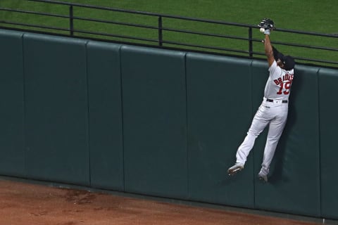 BALTIMORE, MARYLAND – JUNE 14: Jackie Bradley Jr. #19 of the Boston Red Sox stops a possible home run hit by Pedro Severino #28 of the Baltimore Orioles (not pictured) during the sixth inning at Oriole Park at Camden Yards on June 14, 2019 in Baltimore, Maryland. Severino hit a double on the play. (Photo by Patrick Smith/Getty Images)