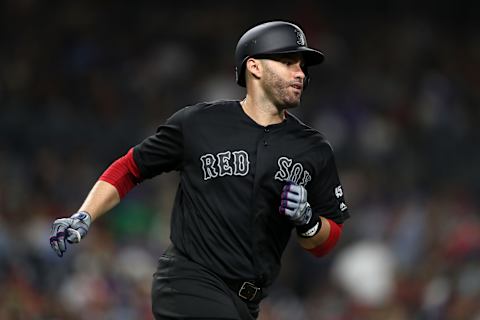 SAN DIEGO, CALIFORNIA – AUGUST 23: J.D. Martinez #28 of the Boston Red Sox runs to first base during a game against the San Diego Padres at PETCO Park on August 23, 2019 in San Diego, California. Teams are wearing special color schemed uniforms with players choosing nicknames to display for Players’ Weekend. (Photo by Sean M. Haffey/Getty Images)