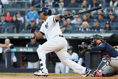 NEW YORK, NEW YORK – OCTOBER 05: Edwin Encarnacion #30 of the New York Yankees hits an RBI single off Randy Dobnak #68 of the Minnesota Twins in the first inning of game two of the American League Division Series at Yankee Stadium on October 05, 2019 in New York City. (Photo by Al Bello/Getty Images)