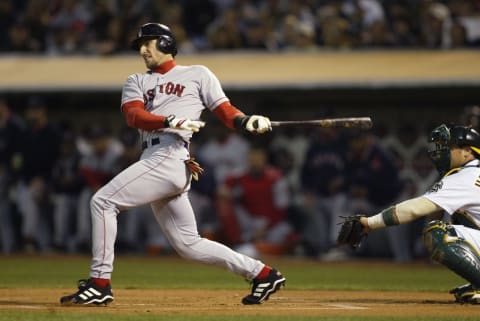 OAKLAND, CA – OCTOBER 1: Shortstop Nomar Garciaparra of the Boston Red Sox hits the ball in the American League Division Series against the Oakland A’s on October 1, 2003 at Network Associates Coliseum in Oakland, California. Oakland defeated Boston 5-4. (Photo by Jeff Gross/Getty Images)