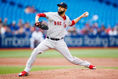 TORONTO, ONTARIO – JULY 2: David Price #10 of the Boston Red Sox pitches against the Toronto Blue Jays in the first inning during a MLB game at the Rogers Centre on July 2, 2019 in Toronto, Canada. (Photo by Mark Blinch/Getty Images)