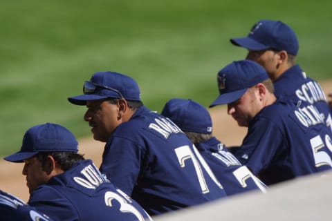 28 Feb 2002 : Instructor Ed Romero of the Milwaukee Brewers looks on during the Spring Training Game against the Oakland A’s in Maryvale, Arizona. The A’s won 16-13. DIGITAL IMAGE. Mandatory Credit: Todd Warshaw/Getty Images