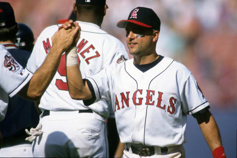 ANAHEIM, CA – MAY 28: Spike Owen #17 of the California Angels high fives teammates following the game against the Boston Red Sox at Anaheim Stadium on May 28, 1995 in Anaheim, California. (Photo by Stephen Dunn/Getty Images)