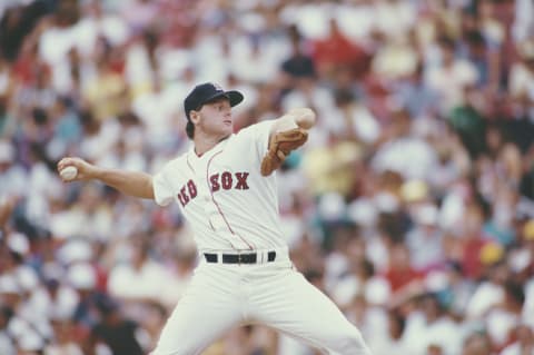 Roger Clemens, pitcher for the Boston Red Sox prepares to throw a pitch during the Major League Baseball American League East game against the Cleveland Indians on 27 May 1987 at Fenway Park in Boston, Massachusetts, United States. The Red Sox defeated the Indians 1 – 0. (Photo by Rick Stewart/Allsport/Getty Images)