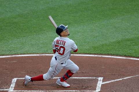 BALTIMORE, MARYLAND – JULY 19: Mookie Betts #50 of the Boston Red Sox bats against the Baltimore Orioles in the first inning at Oriole Park at Camden Yards on July 19, 2019 in Baltimore, Maryland. (Photo by Rob Carr/Getty Images)