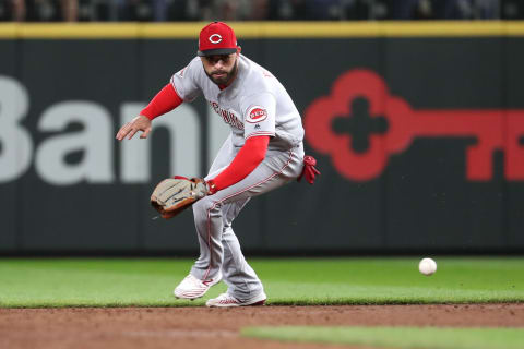 SEATTLE, WASHINGTON – SEPTEMBER 12: Jose Peraza #9 of the Cincinnati Reds fields the ball in the second inning against the Seattle Mariners during their game at T-Mobile Park on September 12, 2019 in Seattle, Washington. (Photo by Abbie Parr/Getty Images)