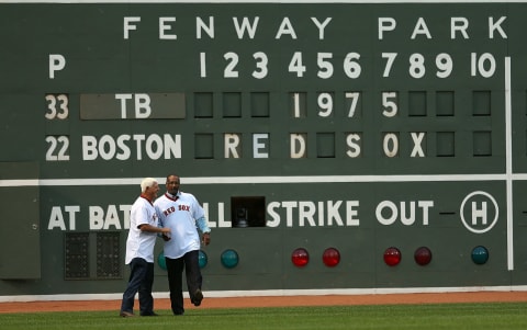 BOSTON, MA – MAY 5: MLB Hall of Fame players Carl Yastrzemski and Jim Rice are introduced in left field during a celebration of the 1975 American League Champions before a game between Boston Red Sox and Tampa Bay Rays at Fenway Park May 5, 2015 in Boston, Massachusetts. (Photo by Jim Rogash/Getty Images)