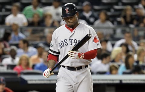 NEW YORK, NY – AUGUST 19: (NEW YORK DAILIES OUT) Carl Crawford #13 of the Boston Red Sox looks on against the New York Yankees at Yankee Stadium on August 19, 2012 in the Bronx borough of New York City. The Yankees defeated the Red Sox 4-1. (Photo by Jim McIsaac/Getty Images)