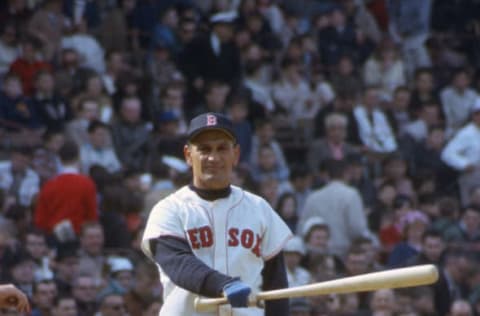 BOSTON, MA – CIRCA 1963: Frank Malzone #11 of the Boston Red Sox bats during an Major League Baseball game circa 1963 at Fenway Park in Boston, Massachusetts. Malzone played for the Red Sox from 1955-65. (Photo by Focus on Sport/Getty Images)