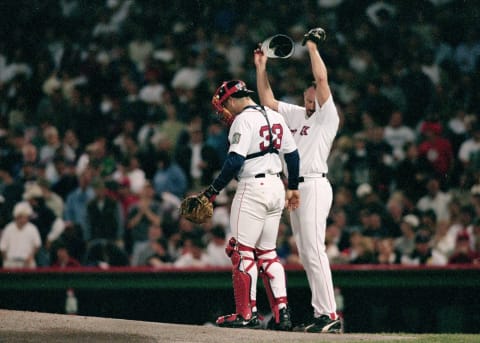 17 Oct 1999: Pitcher Brett Saberhagen #17 of the Boston Red Sox talks with Catcher Jason Varitek #33 at the mound during the ALCS game two against the New York Yankees at Fenway Park in Boston, Massachusetts. The Yankees defeated the Red Sox 9-2. Mandatory Credit: Jonathan Daniel /Allsport