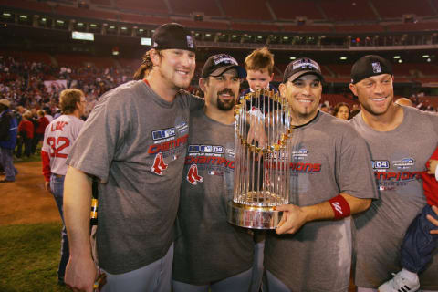 ST. LOUIS – OCTOBER 27: Derek Lowe, Jason Varitek, Doug Mirabelli and Gabe Kapler of the Boston Red Sox celebrate after winning game four of the 2004 World Series against the St. Louis Cardinals at Busch Stadium on October 27, 2004 in St. Louis, Missouri. The Red Sox defeated the Cardinals 3-0 to win their first World Series in 86 years. (Photo by Brad Mangin/MLB Photos via Getty Images)