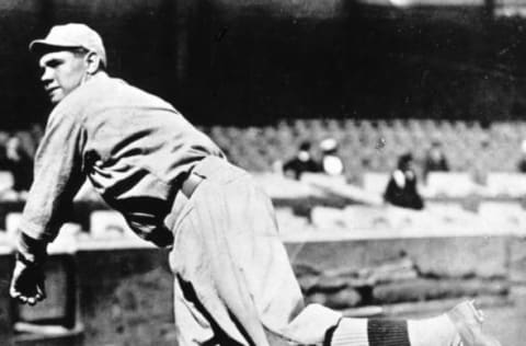 BOSTON – 1918. Babe Ruth, Boston Red Sox pitcher, warms up in Fenway Park before a contest in the 1918 season. (Photo by Mark Rucker/Transcendental Graphics, Getty Images)