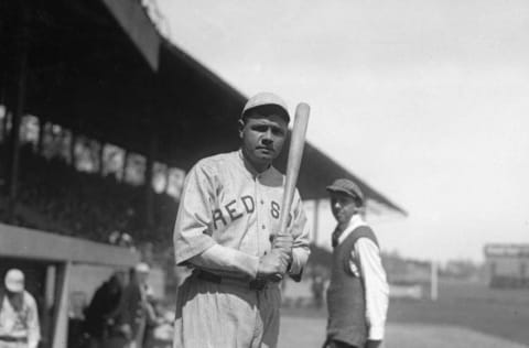 WASHINGTON, D.C. - 1919: Babe Ruth poses outside the dugout for a photo, before a game in what looks like Griffith Stadium in Washington in 1919. (Photo by Mark Rucker/Transcendental Graphics/Getty Images)