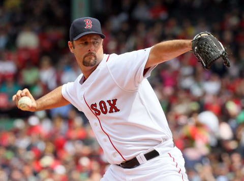 BOSTON – APRIL 25: Tim Wakefield #49 of the Boston Red Sox throws against the Baltimore Orioles at Fenway Park on April 25, 2010 in Boston, Massachusetts. (Photo by Jim Rogash/Getty Images)