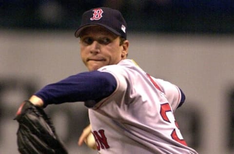 Boston Red Sox starting pitcher David Cone throws a strike 01 October 2001 during the first inning at the Tropicana Field in St. Petersburg, Florida against the Tampa Bay Devil Rays. The Red Sox play the first of a three-game series against the Devil Rays. Cone pitched three innings before being pulled by Manager Joe Kerrigan. AFP PHOTO PETER MUHLY (Photo by PETER MUHLY / AFP) (Photo by PETER MUHLY/AFP via Getty Images)