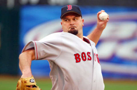 Boston Red Sox starter David Wells pitches during 13-6 loss to the Oakland Athletics at McAfee Coliseum in Oakland, Calif. on Wednesday, May 18, 2005. Wells (2-4) pitched 1 1/3 innings, allowing seven earned runs and nine hits. (Photo by Kirby Lee/Getty Images)